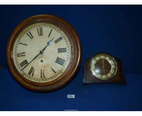 A circular Ansonia Clock Co. wall clock and a Bentima mantle clock.