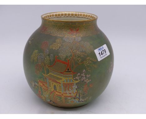 A Carltonware vase in sphere shape with scenes of pagodas and trees in gold highlighted detail on a mottled green ground with