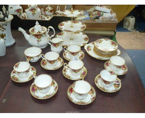 A Royal Albert 'Old Country Roses' tea service for eight with cake stand and some extras..