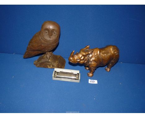 A quantity of miscellanea to include 'Hohner Special 20' harmonica, metal rhino figure, 11" long and a carved wooden owl with