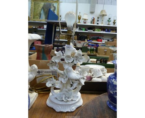 An Italian porcelain table lamp in gloss white finish of Doves amongst blooms and branches, 20" to top of bulb.