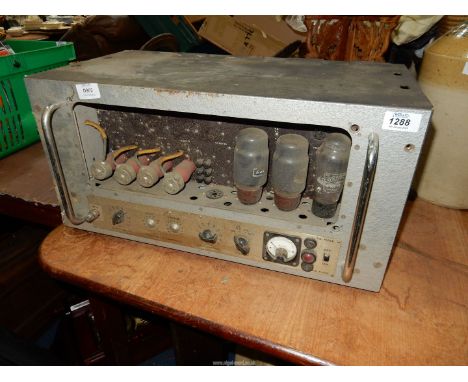 A heavy unbranded vintage Valve Amplifier having milliamperes gauge and chromium plated handles.