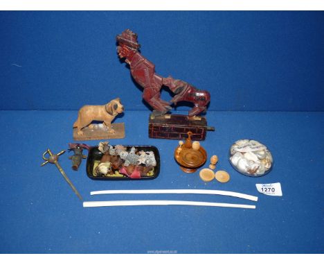 A small quantity of miscellanea including treen novelty man and his dog, St. Bernard figure, miniature table, goblets, etc., 