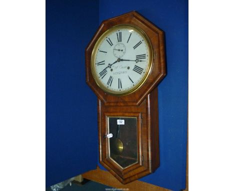 A Rosewood/Walnut finished Wm Oswin of Hereford octagonal surround eight-day Wall Clock having a white painted face with Roma