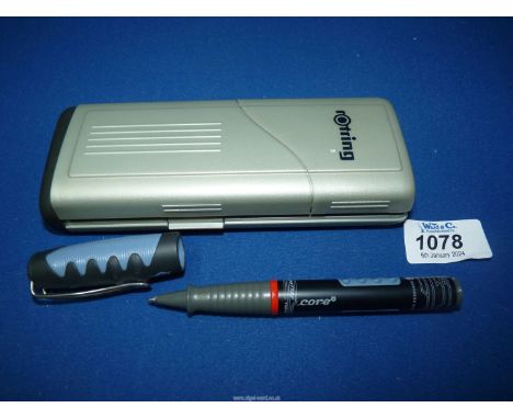 A Rotring Cure roller ball pen in case.