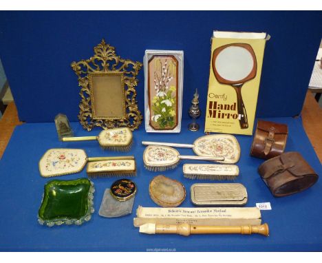 A quantity of miscellanea including a dressing table set with floral design, two cased clothes brushes, perfume bottle, Strat