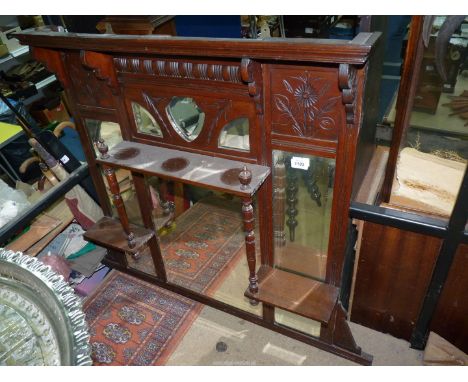 A Mahogany over mantel Mirror having multiple bevelled mirrors and a shelf with turned supports, 39 1/2'' wide and 36'' high 