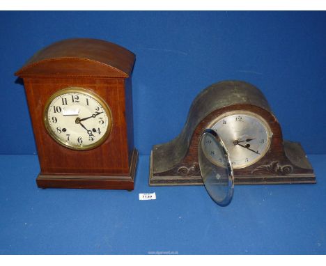 A mantle Clock with Arabic numerals and inlaid detail to the case, with key and pendulum, face glass loose and back panel a/f
