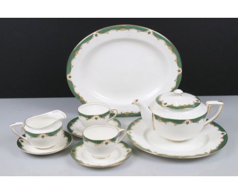 Royal Worcester Connaught tea and dinner ware to include a teapot, 10 coffee cups and saucers, sugar bowl, cream/milk jug, a 