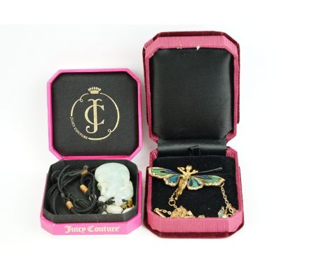 An art nouveau style necklace together with a Chinese jade amulet. 