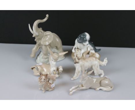 Four Lladro porcelain figures of animals (donkey in love, another lying donkey, 2 dog figures) plus 2 Nao figures (rearing el