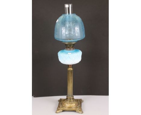 Late 19th / Early 20th century Oil Lamp with ornate brass Corinthian column base, turquoise embossed china font and floral et