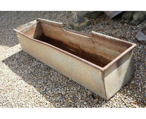 A large galvanised steel water trough, measures approx 186cm in length. 
