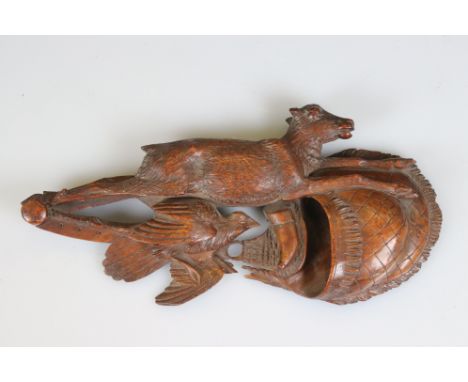 A Black Forest hand carved hunting plaque. 