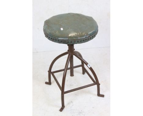 Vintage metal industrial stool with revolving leather seat 