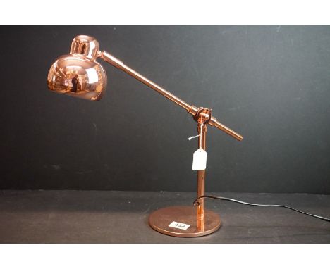 Contemporary copper coloured Anglepoise lamp 
