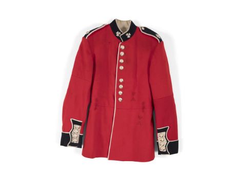 AN IRISH GUARDS CEREMONIAL TUNIC, 1959 pattern, in red and navy cloth, with shoulder straps and collar woven with twin shamro
