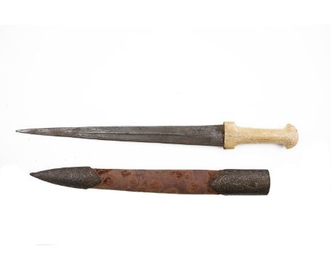 A CAUCASIAN KINDJAL DAGGER , 19th centurywith walrus ivory handle and double edged and pointed blade engraved with ethnic des