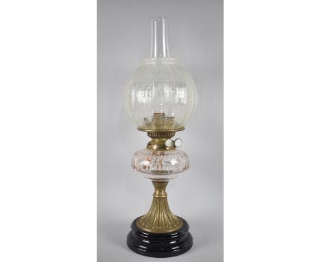 A Late Victorian Brass Based Oil Lamp with Plain Glass Reservoir and Etched Shade, Complete with Chimney, 56cms High 