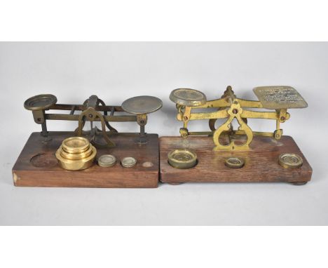 Two Early 20th Century Brass Postage Scales and Weights on Wooden Plinth 