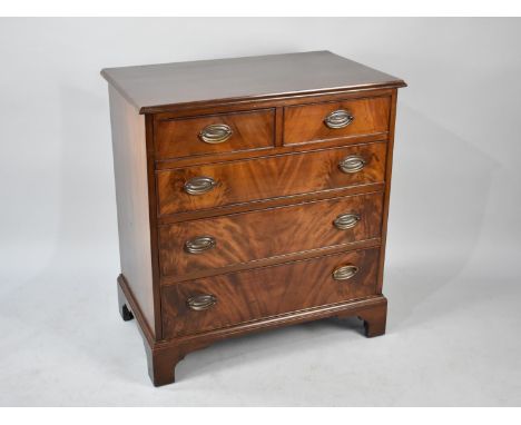 An Oak Lined Mahogany Chest of Two Short and Three Long Drawers with Oval Brass Drop handles, Small Proportions with Bracket 