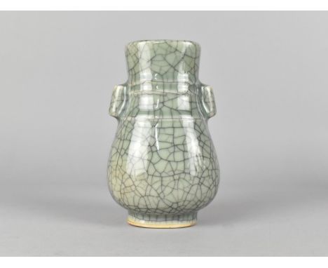 A Chinese Celadon Crackle Glazed Arrow Vase, 13.5cm high 