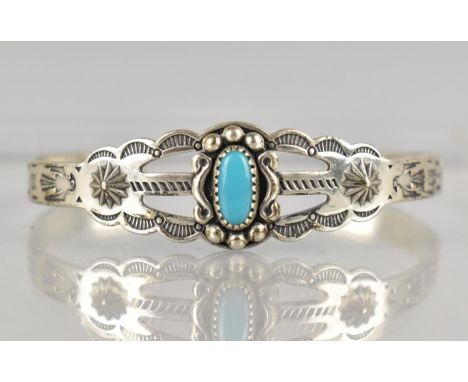 A Small Childs Navajo Bangle with Turquoise Cabochon, Decorated with Thunderbirds, Arrows Etc and Stamped Sterling and Makers