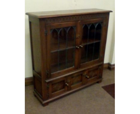 Solid Oak Bookcase, Leaded Glass Doors Enclosing a Single Shelf Over a Blind Cabinet 