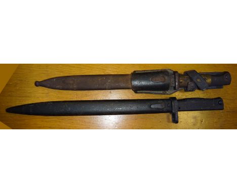 A WWI German Ersatz bayonet, fullered blade 12¼”, steel hilt with plain grip and three quarter muzzle ring, in its steel scab