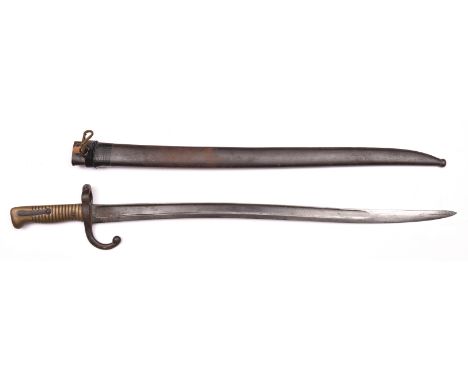 A French M1866 Chassepot bayonet, the blade engraved “Mre Rle de Chatt. Juillet 1871”, in its steel scabbard with non matchin