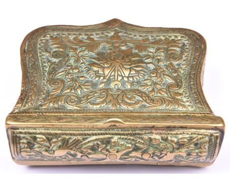 A Caucasian brass patch or cartridge box, approx 4½” x 4¾”, with hinged lid, embossed overall with flowers and foliage, styli