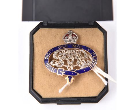 A fine 9ct gold and enamel sweetheart brooch of the Grenadier Guards, the crown and cypher of George VI of silver inset with 