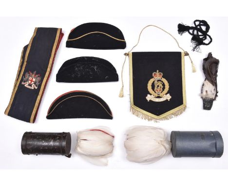 Three officers’ field caps: black with red centre and gold piping (2, one slightly mothed), and black with red centre and bla