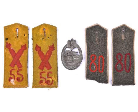 A Third Reich Panzer Assault badge, of grey metal, with slightly concave unmarked flat back and round pin. GC, minor corrosio
