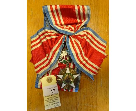 Liberia: Order of African Redemption sash and sash badge, in gilt with 5 pointed white enamelled cross supporting central dev