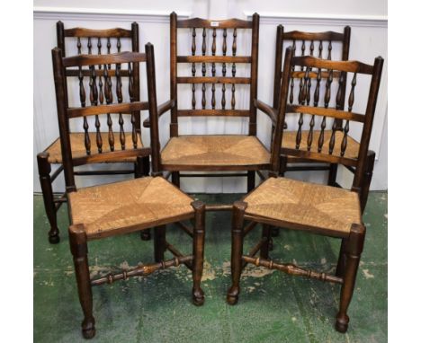 A set of five Lancashire ladder back rush seated dining chairs