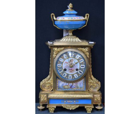 A 19th century French porcelain mounted gilt metal mantel clock, 10.5cm dial inscribed with Roman numerals, 14-day Miroy-Requ