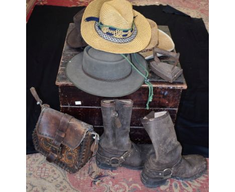 A pine trunk with contents, including a pair of Loblan boots, a flat iron, trivet, etc