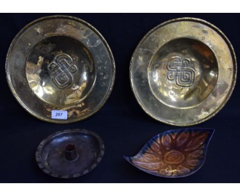 A pair of Glasgow School Celtic Arts and Crafts dishes; an enamel leaf dish; an Arts and Crafts copper candlestick, marked HW