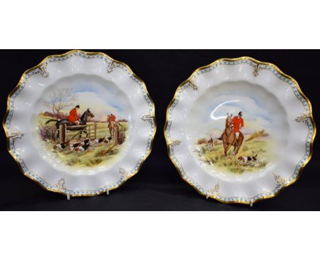 A pair of Royal Crown Derby wavy edged hunting plates, signed J Doyle