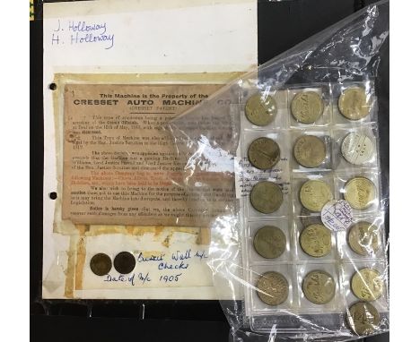 An Album of mining lamp tokens, engineering and other brass checks/tokens with an Album of amusement arcade tokens and model 