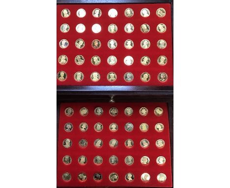A cased set of 70 gold plated commemorative medallions entitled "Our Royal Sovereigns" together with a cased set of 6 WW1 Com