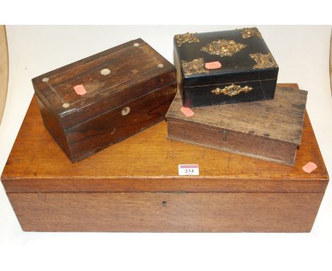 A large 19th century oak cutlery box together with mother-of-pearl inlaid rosewood caddy, and three other boxes