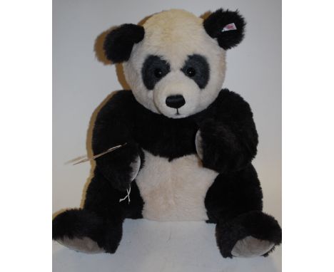 Steiff Giant Panda, white tag No.668302, limited edition of 1500 pieces, dated 2005, black and white mohair body with working