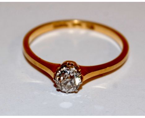 A ladies 18ct gold diamond solitaire ring