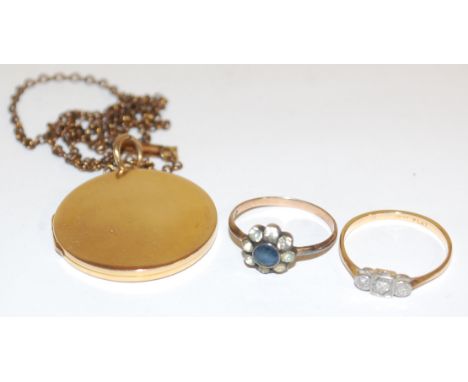 A 9ct gold circular picture locket on gilt metal neck chain, 9ct gold and platinum diamond set dress ring, and one other (3)