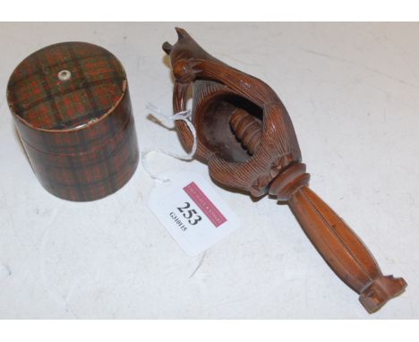 A Victorian tartanware string box and a carved wood nutcracker (2)