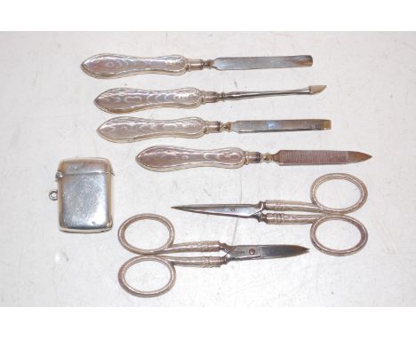 Silver pocket vesta case and assorted silver handled work tools to include files, tweezers, scissors etc