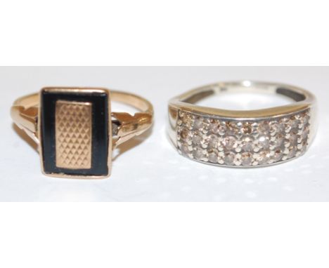 A 9ct white gold diamond set dress ring, and a yellow gold and black enamel signet ring (2)