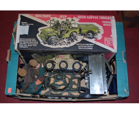 A collection of loose and boxed Action Man and military related toys to include; Cherilea military Jeep with supply trailer 